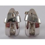 Asprey . A pair of white metal (tests 18 carat gold) earrings, signed Asprey, approx 2cm, 11.