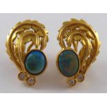 A fine pair of yellow metal (tests 18 carat gold) opal and diamond earrings, opals approx 9 - 9.