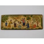 A Persian ivory panel of a group of musicians and a dancer girl. 10.5x4cm.