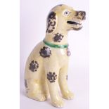 AN 18TH CENTURY CHINESE EXPORT YELLOW GLAZED HOUND modelled with mouth open and resting upon its