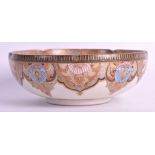 AN EARLY 20TH CENTURY JAPANESE MEIJI PERIOD SATSUMA SCALLOPED BOWL painted with figures within