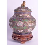 AN EARLY 20TH CENTURY CHINESE CLOISONNE ENAMEL JAR AND COVER Late Qing, decorated with scattered