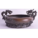 A 19TH CENTURY JAPANESE MEIJI PERIOD BRONZE CENSER modelled with two opposing three claw dragons