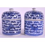 A PAIR OF EARLY 20TH CENTURY CHINESE BLUE AND WHITE VESSELS AND COVERS Guangxu, painted with bats