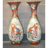 A HUGE PAIR OF 19TH CENTURY JAPANESE MEIJI PERIOD KUTANI PORCELAIN VASES with scalloped flared rims,