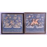 A GOOD NEAR PAIR OF 19TH CENTURY CHINESE SILK KESI PANELS depicting birds perched upon a rock