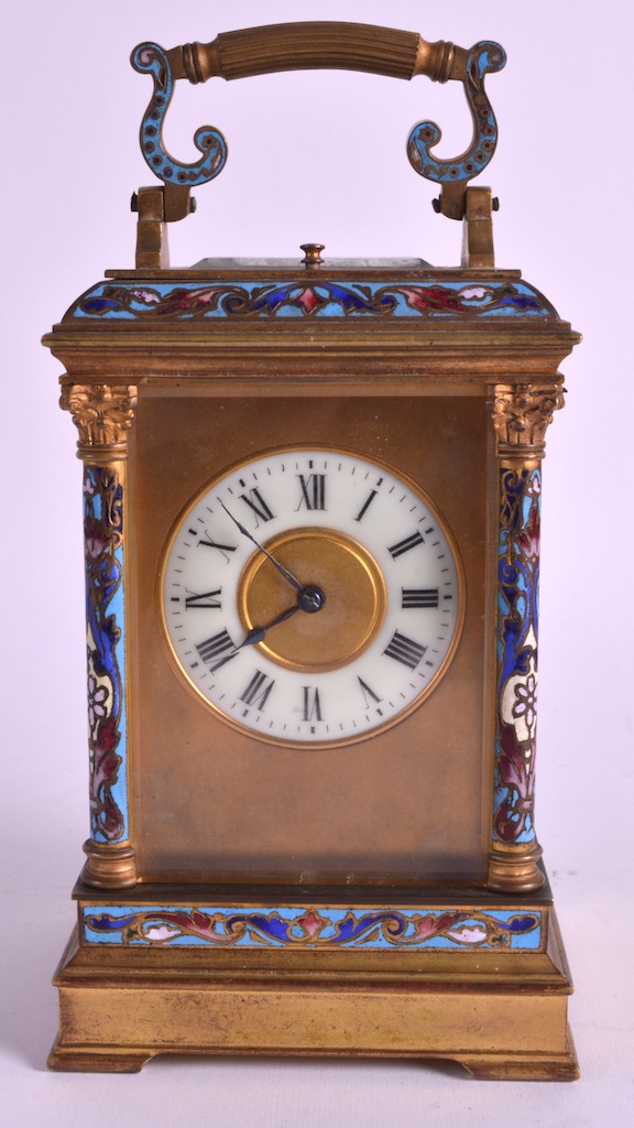 A LATE 19TH CENTURY FRENCH BRASS CHAMPLEVE ENAMEL CARRIAGE CLOCK with elaborate floral mounts and