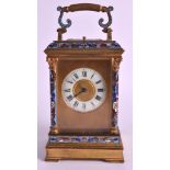 A LATE 19TH CENTURY FRENCH BRASS CHAMPLEVE ENAMEL CARRIAGE CLOCK with elaborate floral mounts and