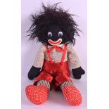 AN UNUSUAL PLUSH GOLLY DOLL modelled in heart embellished wares. 1ft 7ins high.