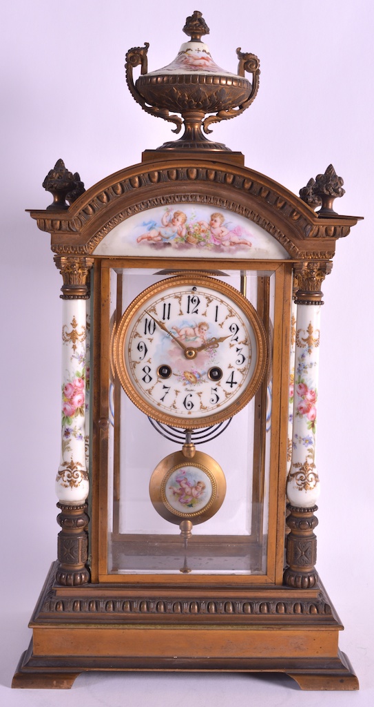 A GOOD 19TH CENTURY FRENCH PORCELAIN AND BRONZE MANTEL CLOCK with painted cherub dial and floral