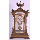 A GOOD 19TH CENTURY FRENCH PORCELAIN AND BRONZE MANTEL CLOCK with painted cherub dial and floral