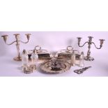 A MATCHED PAIR OF SILVER PLATED CANDLESTICKS together with plated tureens, grape scissors etc. (