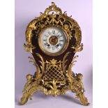 A LATE 19TH CENTURY WALNUT AND GILT METAL BALLOON SHAPED MANTEL CLOCK retailed by Lowe & Son of