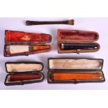 A COLLECTION OF EDWARDIAN AND LATER CIGARETTE HOLDERS including amber examples etc. (qty)