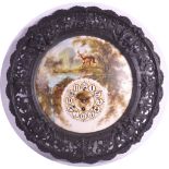 A 19TH CENTURY EIGHT DAY CONTINENTAL WALL CLOCK with ornate cast surround, the enamel dial decorated