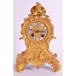 A FINE 19TH CENTURY ORMOLU MANTEL CLOCK by Raingo of Paris, surmounted with a dolhpin supported upon