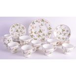 A WEDGWOOD 'WILD STRAWBERRY' PART TEA SERVICE comprising of 6 x teacups & saucers, 6 x side