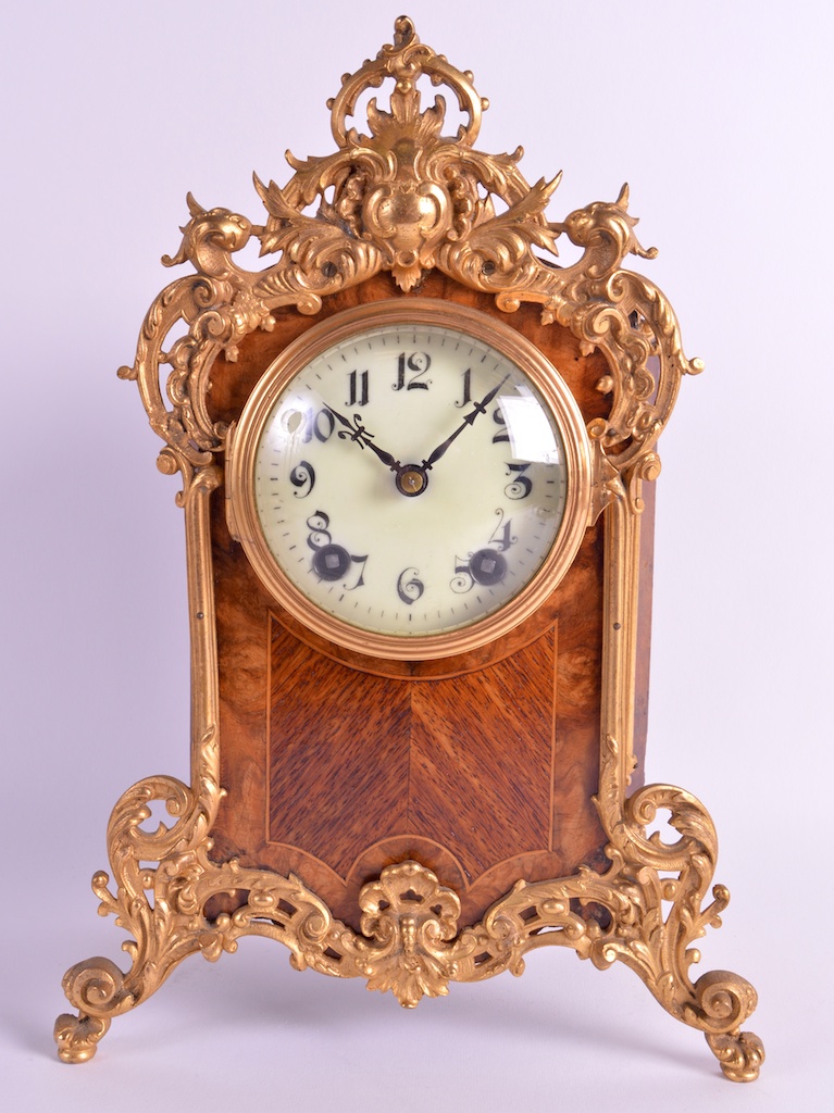 AN EARLY 20TH CENTURY GERMAN WALNUT EIGHT DAY MOVEMENT MANTEL CLOCK C1900 with gilt metal foliate