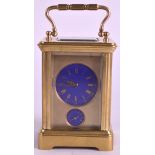 A LATE 19TH CENTURY FRENCH MINIATURE CARRIAGE CLOCK with two blue enamelled circular dials with gilt