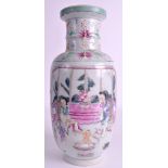 A 19TH CENTURY CHINESE FAMILLE ROSE ROULEAU VASE Guangxu, bearing Qianlong marks to base,