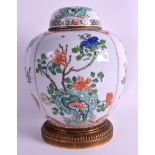 A CHINESE QING DYNASTY FAMILLE VERTE GINGER JAR AND COVER Kangxi style, painted with bold enamels