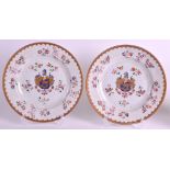 A PAIR OF SAMSONS OF PARIS CHINESE EXPORT STYLE PLATES bearing spurious crest and floral border.