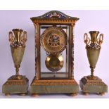 A 19TH CENTURY FRENCH CHAMPLEVE ENAMEL FOUR GLASS CLOCK GARNITURE enamelled all over with flowers