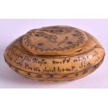 A MID 19TH CENTURY GERMAN CARVED HORN SNUFF BOX AND COVER Dated 1846, decorated with figures