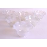 A SET OF SIX ART DECO VASELINE GLASS LAMPSHADES. 5.5ins wide. (6)