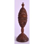 A 19TH CENTURY CARVED COQUILLA NUT POMANDER with turned finial, decorated with flowers. 6.25ins