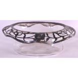 AN EARLY 20TH CENTURY SILVER OVERLAID GLASS BOWL decorated with flowers. 8.5ins wide.