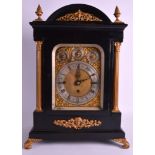 A GOOD REGENCY EBONISED EIGHT BELL BRACKET CLOCK with carved wood acanthus mounts and corinthian