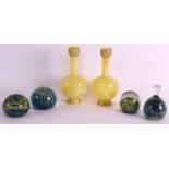 A GROUP OF FOUR 1970S MDINA PAPERWEIGHTS by Michael Harris, together with a pair of Bohemian