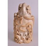 A LOVELY 19TH CENTURY JAPANESE MEIJI PERIOD CARVED IVORY TUSK VASE AND COVER formed as an octopus