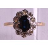 AN 18CT GOLD SAPPHIRE AND DIAMOND RING.