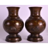 A LOVELY PAIR OF 19TH CENTURY JAPANESE MEIJI PERIOD BRONZE VASES of bulbous form, decorated with