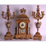 A LATE 19TH CENTURY FRENCH GILT METAL AND CHAMPLEVE ENAMEL CLOCK GARNITURE decorated with flowers,