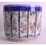 AN UNUSUAL 19TH CENTURY JAPANESE MEIJI PERIOD BLUE AND WHITE PLANTER painted with numerous panels of