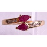 A 9CT GOLD RUBY AND DIAMOND RING.