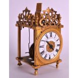 A MID 19TH CENTURY FRENCH BRASS MINIATURE LANTERN CLOCK with ornate top and white enamel dial