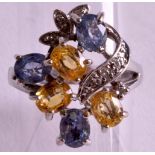 AN 18CT GOLD BLUE & YELLOW SAPPHIRE & DIAMOND RING.