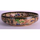 AN UNUSUAL EARLY 20TH CENTURY JAPANESE TAISHO PERIOD CLOISONNE ENAMEL BOWL decorated with foliage