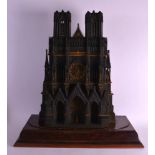 A LOVELY MID 19TH CENTURY FRENCH BRONZE ARCHITECTURAL MANTEL CLOCK depicting Reims cathedral,