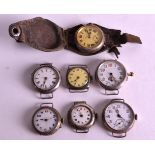 A GROUP OF SEVEN TRENCH STYLE GENTLEMANS SILVER WATCHES. (7)