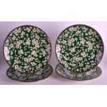 A SET OF FOUR 19TH CENTURY JAPANESE MEIJI PERIOD GREEN GLAZED PLATES painted with flowering almond