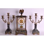 A 19TH CENTURY FRENCH EMPIRE STYLE CLOCK GARNITURE the mantel surmounted with an eagle and