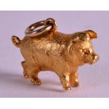 A LOVELY SOLID 18CT YELLOW GOLD EDWARDIAN CHARM in the form of a pig. 0.75ins wide. 17.9grams.