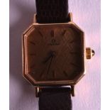 A LADIES 9CT YELLOW GOLD OMEGA WRISTWATCH with original case and papers.