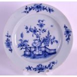 A RARE 18TH CENTURY LOWESTOFT BLUE AND WHITE PLATE painted with a fence rock and flowers. 7.75ins