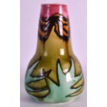 A MINTON SECESSIONIST ART NOUVEAU VASE No.12, painted with foliage on a green ground. 5.5ins high,